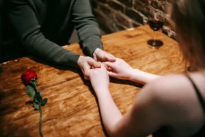 99+ Smooth Rizz Lines That Actually Work in 2025 5 A sweet couple having dinner.
